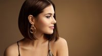 Beautiful,Woman,Profile,Portrait,With,Golden,Earring,Bob,Hair,Style